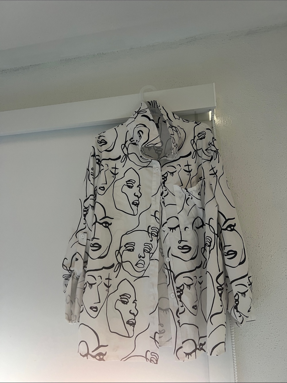 SHEIN White Button-Up Shirt with Black Abstract Face Print